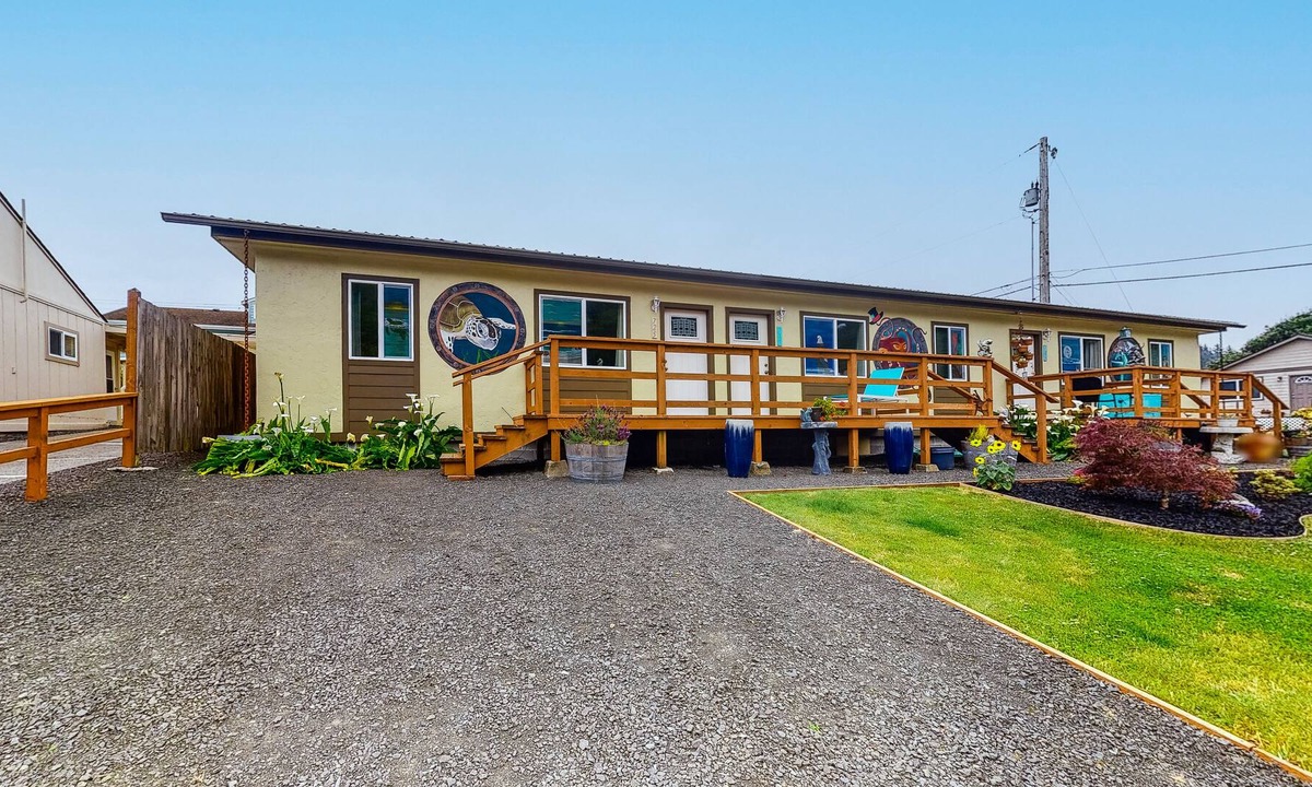 Winchester Bay Condo | Centrally located condo w/ large deck - near the dunes, 1 dog OK!