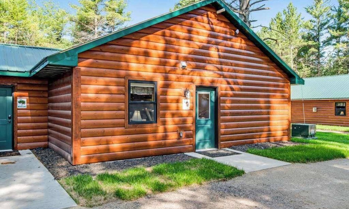 Conover House | Charming dog-friendly cabin with hot tub, fireplace, patio, grill, & central AC