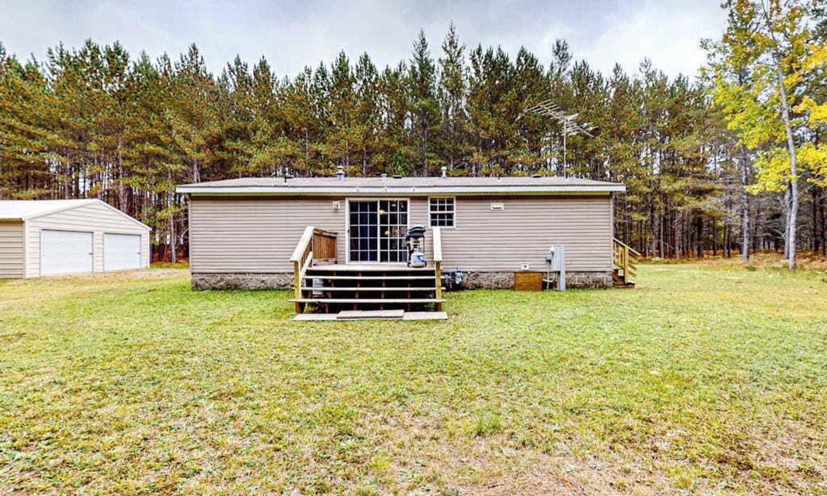 Conover House | Cozy, dog-friendly home with on-site snowmobile/ATV trails & firepit