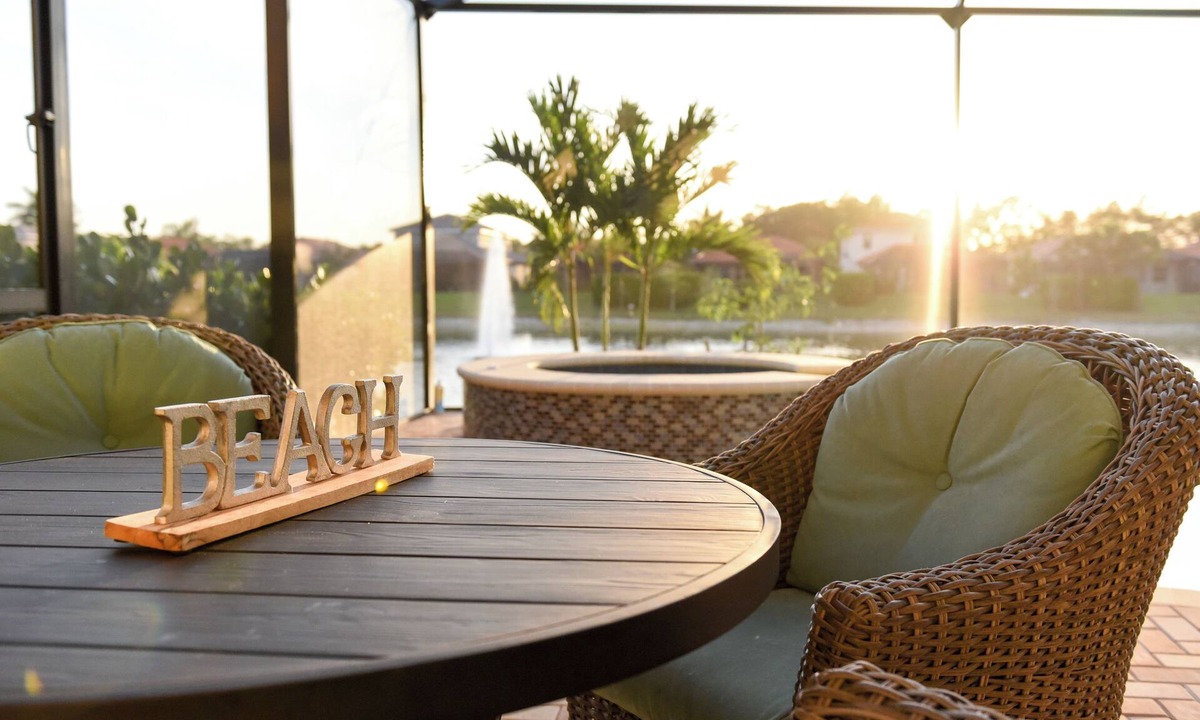 Naples Heritage Villa | Grand 4/3 pool home with beautiful lake sunset views minutes from the beach!