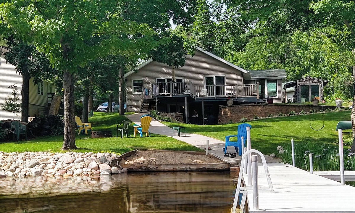 Wautoma House | Lakefront Home with Sandy Walk-In Shoreline & Private Pier on Lake Morris Chain