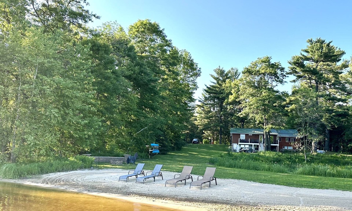Augusta Cabin | Lakeside Log Cabin - Enjoy a beautiful sugar sand beach, Fireplace