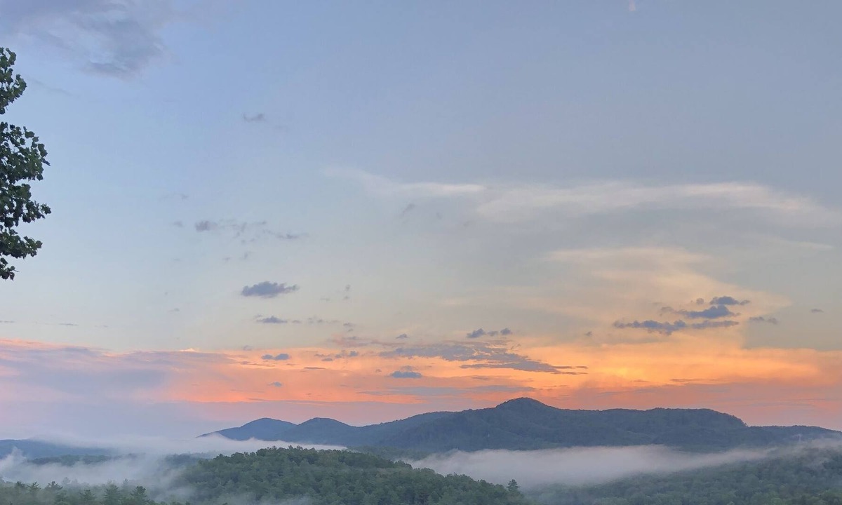 Sunset House | Spectacular view of a gorgeous mountain valley and golf course awaits you