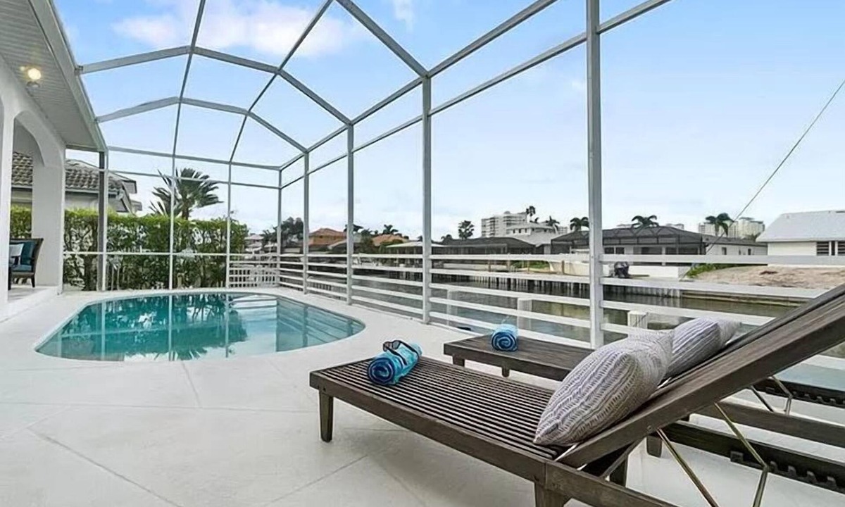 Vanderbilt Beach House | 🌊 Sunshine Retreat | Pool + Sun Deck Walk to Vanderbilt Beach Canal Front