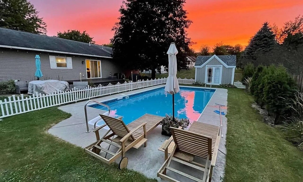Wausau House | The Ultimate Playhouse: Heated Pool-Fireplace-Game Room-TheaterLounger-2Dogs OK