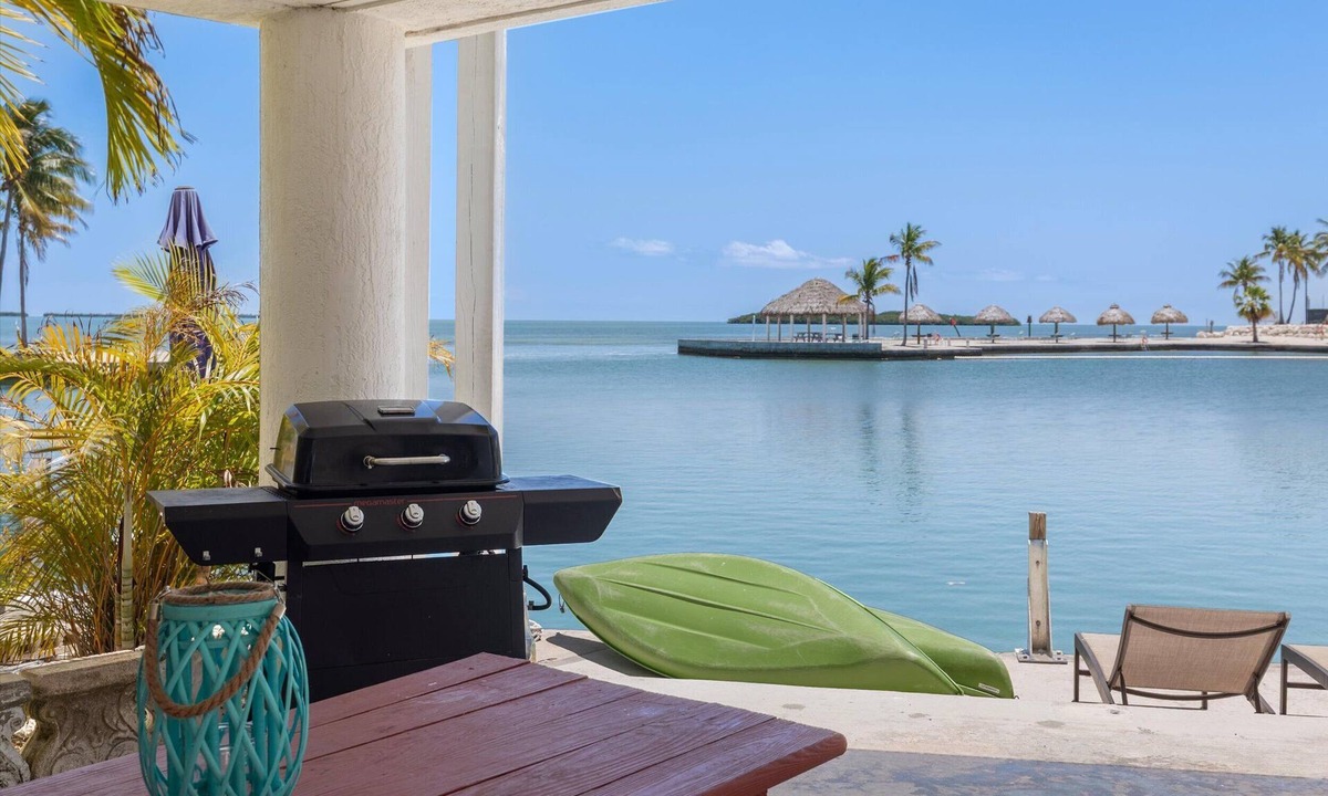 Cudjoe Key House | Waterfront 2BR in Venture Out with 35' Dock, Pool & Marina Basin Views
