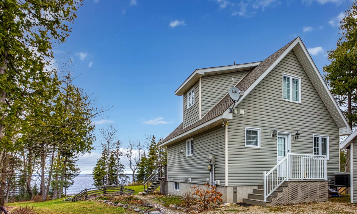 Manitoulin District House | Waterfront, chalet style home; minutes walk to the beach