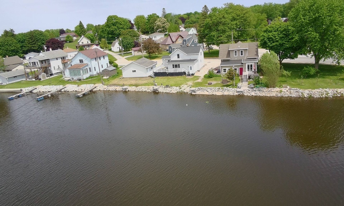 Algoma House | Waterfront, Serene 4-Bedroom House on Ahnapee River with Boat Dock/Slip