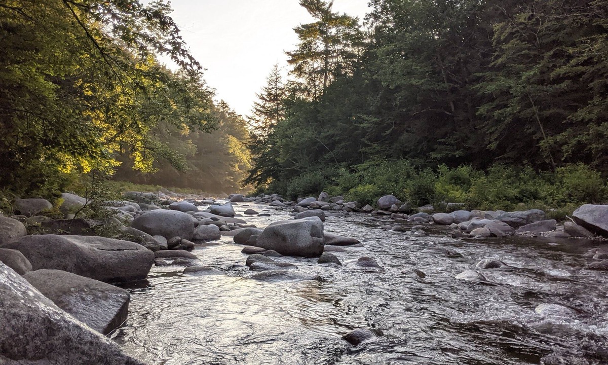 Woodsville Cabin | White Mountain scenic river camp with cozy cabin & comfy RV