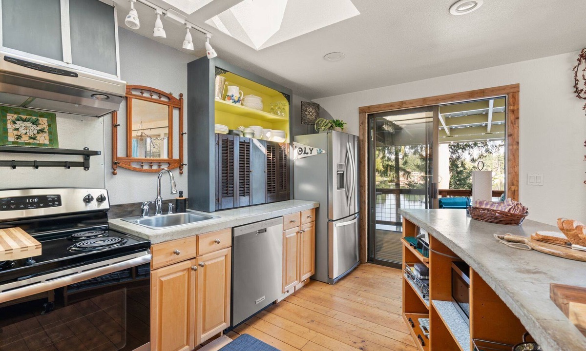 Lacey House | Your eclectic escape! Lakefront home in Lacey w/private patios and dock