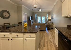 Beachside condo with bikes, central AC, screened patio & outdoor pool