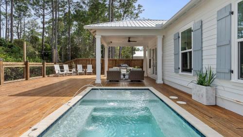 San Juan House | Sleeps 34 2 Homes Private Pools Firepit Golf Cart Walk to Beach Seagrove San Juan by AvantStay