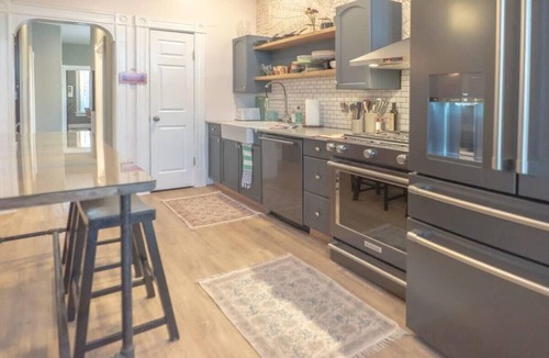 Tower Grove East Condo | 2BR with Workspaces & Deck ABODEbucks