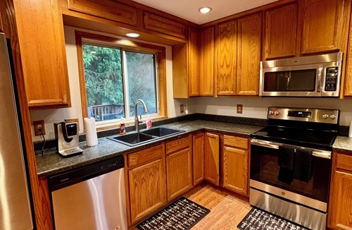 Rock Creek House | 4BR Comfort Home 3 Baths King Beds Fully Equipped + Big Fenced Yard