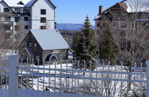 Stratton Mountain Condo | 5 minute walk to lifts and Stratton Village! Cozy fireplace with a private patio