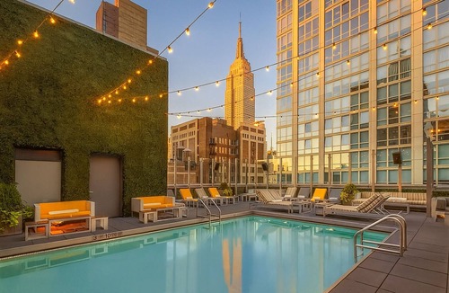 Rose Hill Hotel | A Restful Retreat! 4 Convenient Units, Rooftop Pool, Pet-friendly Property