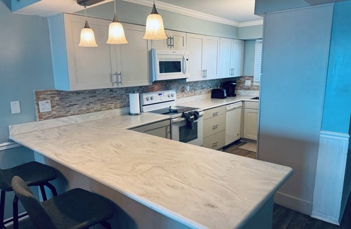 Biltmore Beach Condo | AWESOME SUMMER DEAL:8/29-9/5=1250 Total!5star/Beachfront/FREE Beach Chairs