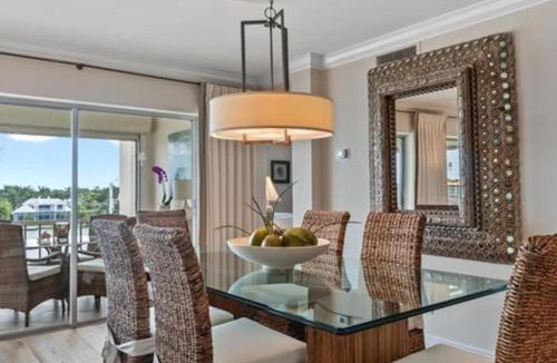 Moorings Apartment | Bayfront Condo with Screened Lanai and Beach Acces