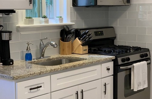 Islip Terrace Apartment | Beautifully decorated1BR Apartment - Full Kitchen, Private Backyard & Fire Pit!