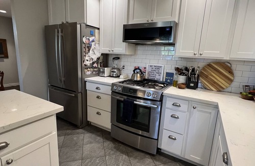 Hilltop House | Beautifully renovated 100yr old craftsman home near Stadium District.