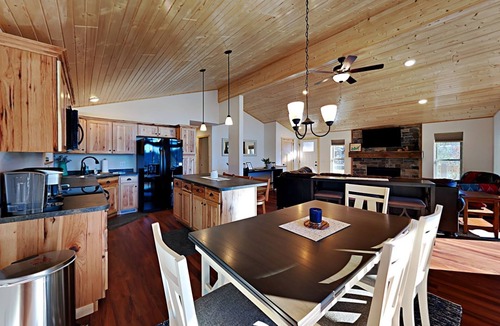 Chief Lake Cabin | Brand New 5 bedroom Lacourte Orellies lakefront home with covered deck and amazing lake views.