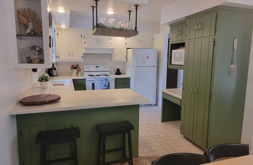 Two Rivers House | Charming 3-bedroom dog friendly home on 5 secluded acres in Two Rivers.