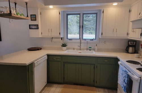 Two Rivers House | Charming 3-bedroom dog friendly home on 5 secluded acres in Two Rivers.