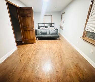 Elmont Apartment | Cheerful 4-bedroom home with free parking