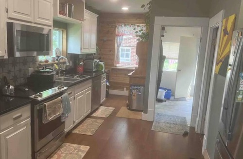 Chanute House | Come stay in this unique peacful cabin, tucked away in our large yard.