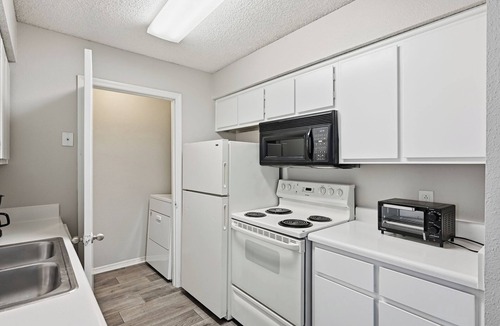 Nashville Apartment | Comfortable layout with fireplace and dining area