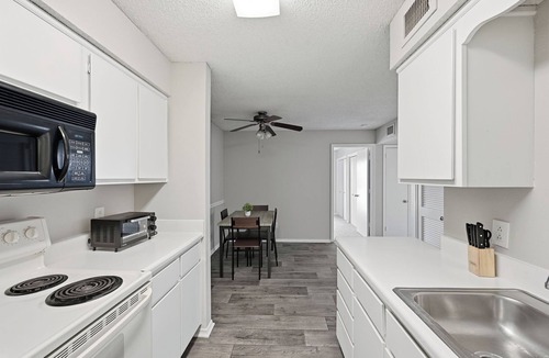 Nashville Apartment | Comfortable layout with fireplace and dining area