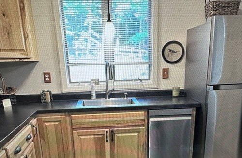 Stambaugh House | Cozy chalet located in Ski Brule Village features 4 bedrooms and 2 living areas.