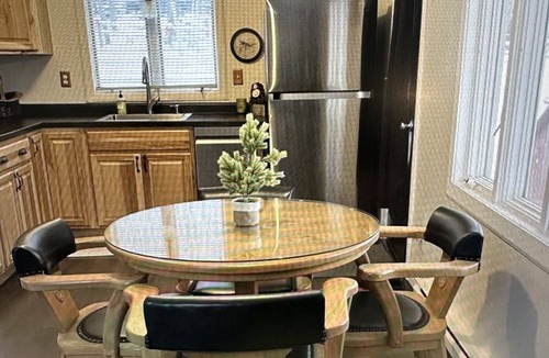 Stambaugh House | Cozy chalet located in Ski Brule Village features 4 bedrooms and 2 living areas.