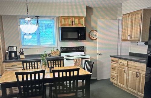 Stambaugh House | Cozy chalet located in Ski Brule Village features 4 bedrooms and 2 living areas.