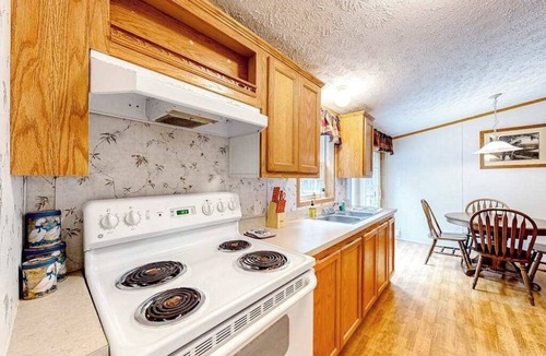 Conover House | Cozy, dog-friendly home with on-site snowmobile/ATV trails & firepit