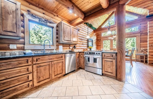 Carriage Hills Cabin | Creekside cabin with hot tub, views, fireplace