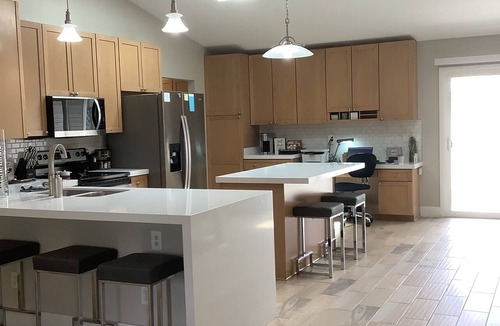 Findlay House | Crystal Rose is a spacious, modern and bright home with an attached 2 car garage