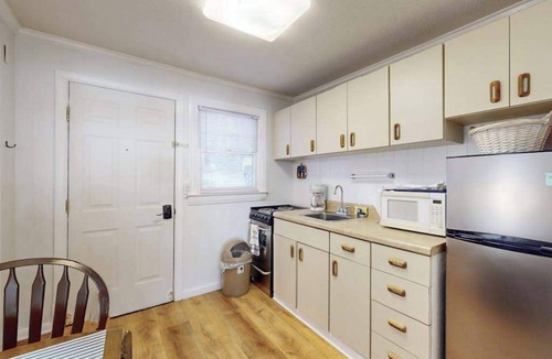 Flat Rock Condo | Dog-friendly lakefront condo with pool, canoes, & WiFi - in a perfect location