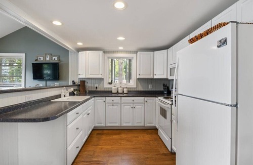 Acton House | Dog Friendly Lakefront Cottage with Private Dock and Kayaks