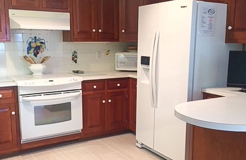 Alton House | Dog-friendly waterfront home with a washer/dryer, volleyball court, deck & grill
