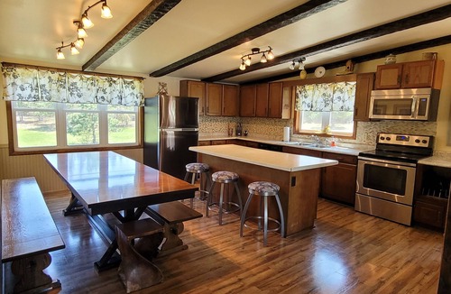 Gordon House | Exclusive Retreat! Private Lake, River Frontage and 100's of Acres with Trails