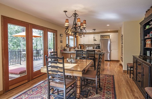 Black Butte Ranch House | GH219 | Luxury home with a private hot tub and large deck and grassy yard.