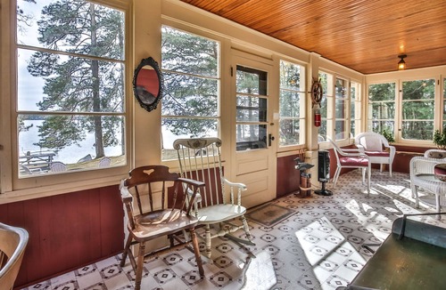 St Germain House | Gorgeous lakefront cabin, wrap-around enclosed porch, dock!