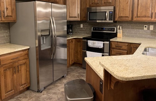 Spirit Lake Condo | Ground Floor Lakefront Unit with Stunning Views of East Lake