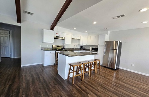 Barrett House | Houston Riverfront Getaway house with pool and hot tub