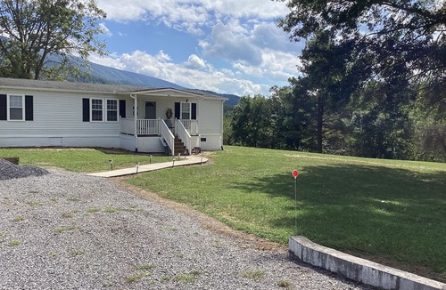 Covington House | joins the hiking and biking trail. Walk to the river to fish, kayak or relax.