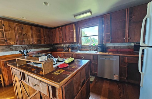 Winchester House | Just minutes from downtown Winchester, explore 62 scenic acres with roaming peacocks, horses, cows, and sheep. Enjoy a petting zoo or horse riding lessons for an unforgettable farm adventure!