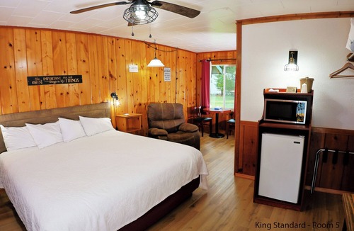 Florence Hotel | King Standard: Rustic Knotty Pine Retreat w/Recliner & Nature Vibes
