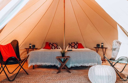 Valle House | King Tent w/Shared Bathroom - Find us among the juniper trees and the open sky.