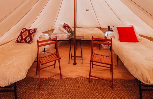 Valle House | King Tent w/Shared Bathroom - Find us among the juniper trees and the open sky.